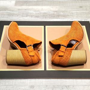 Women cut out ankle booties
